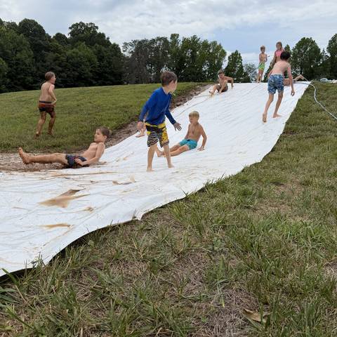 Campers on the slip-and-slide