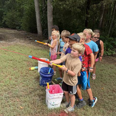 Campers with water toys