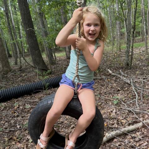 Camper on the tire swing