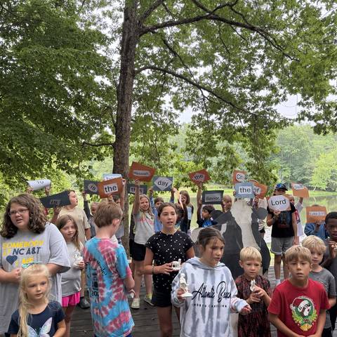 Big group of campers in the woods