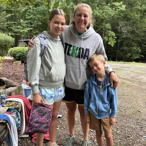 Counselors with a camper