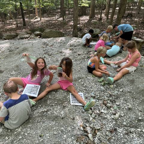 Campers playing in the creek bed