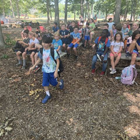 Campers gathered in the outdoor chapel