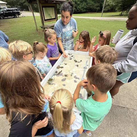 Campers making a craft together