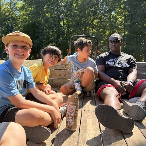 Campers and counselors sitting together