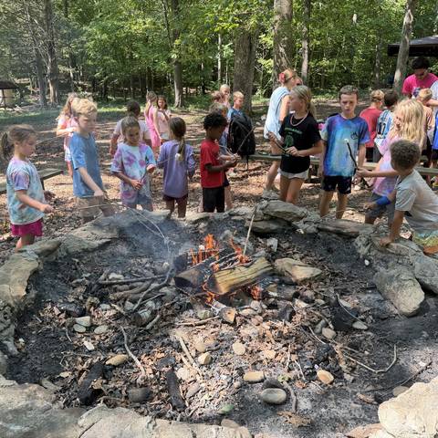 Campers around the fire pit