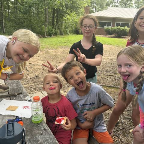Campers doing a science activity