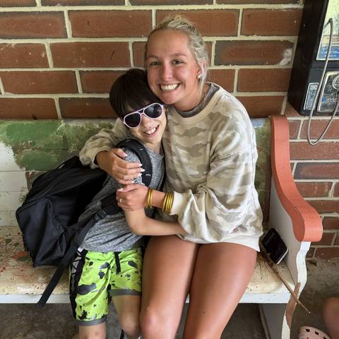 Two campers smiling