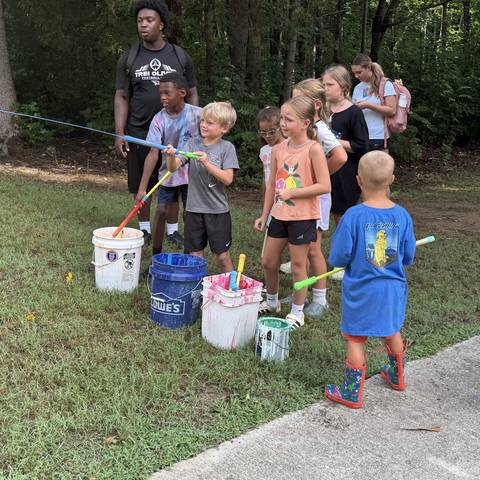 Campers with buckets